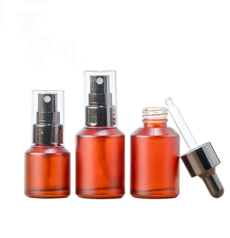 Cosmetic container glass Rose gold lotion bottle with pump dispenser dropper