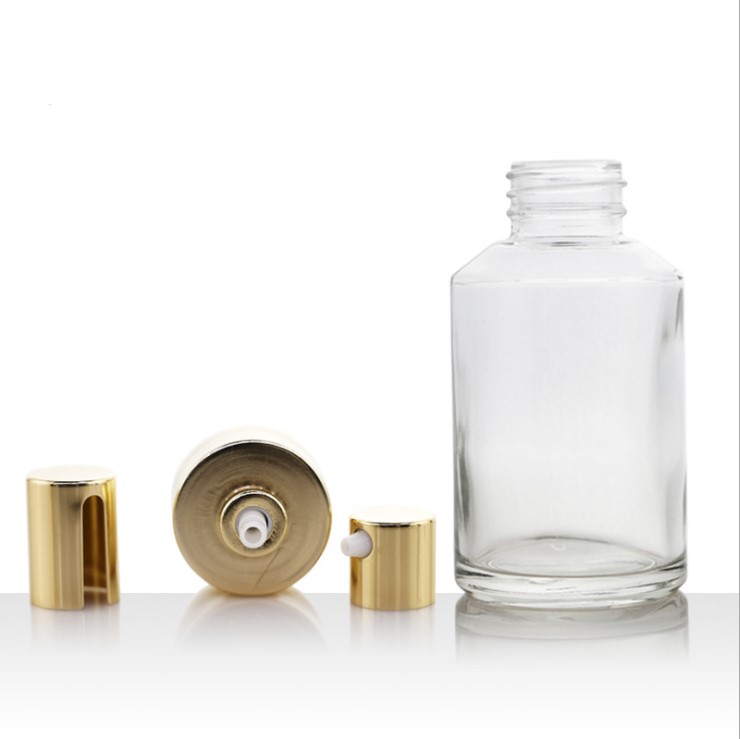 Cosmetic container glass Rose gold lotion bottle with pump dispenser dropper