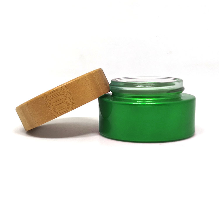 Cosmetic empty round wholesale bamboo green frosted glass cosmetic jar 50g 100g