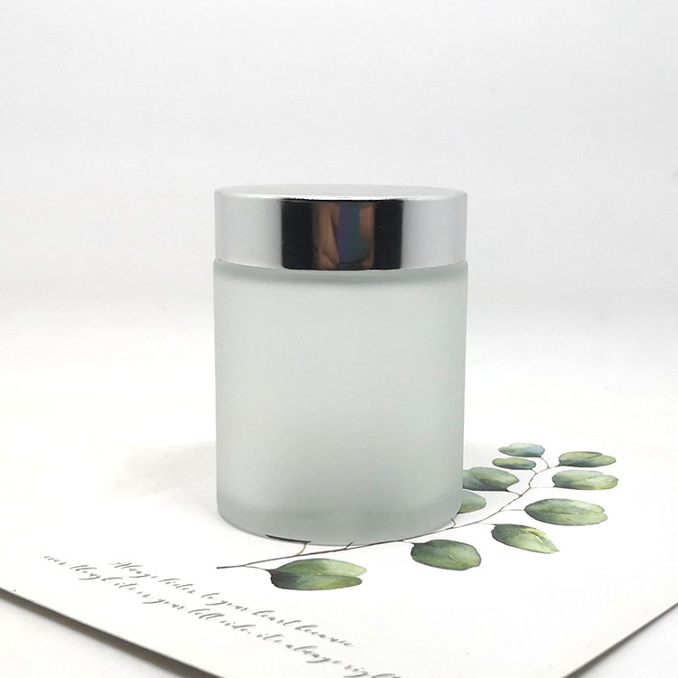Cosmetic facial clay container 100g clear glass jar frosted with silver aluminium lid