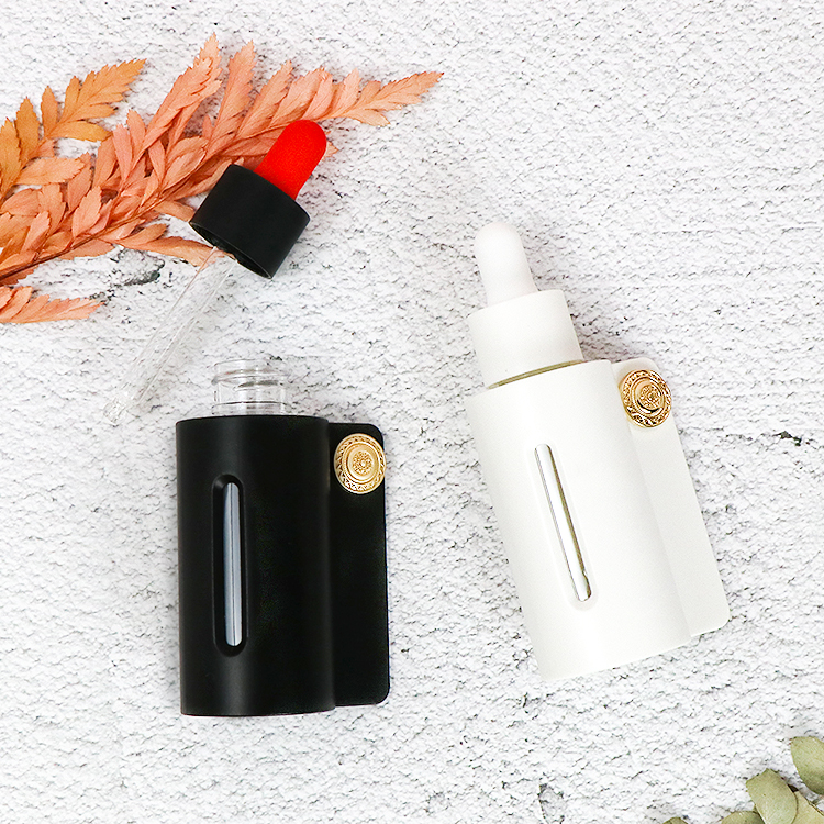 Cosmetic glass bottle 30ml with plastic cover sleeve