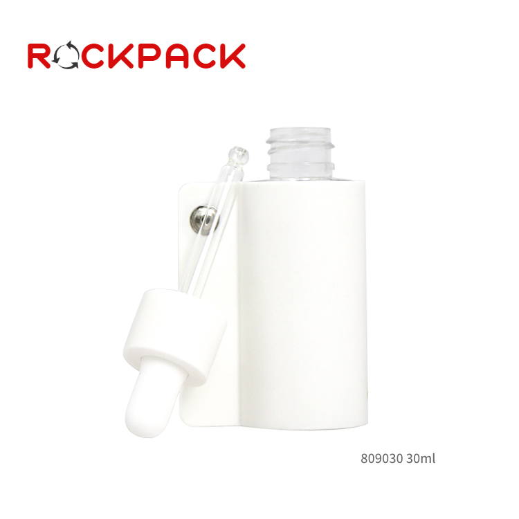 Cosmetic glass bottle 30ml with plastic cover sleeve