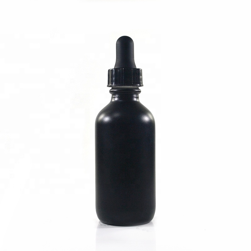 Cosmetic hair oil packaging 1oz 2oz 60ml matte black frosted glass boston round bottle with childproof screw cap