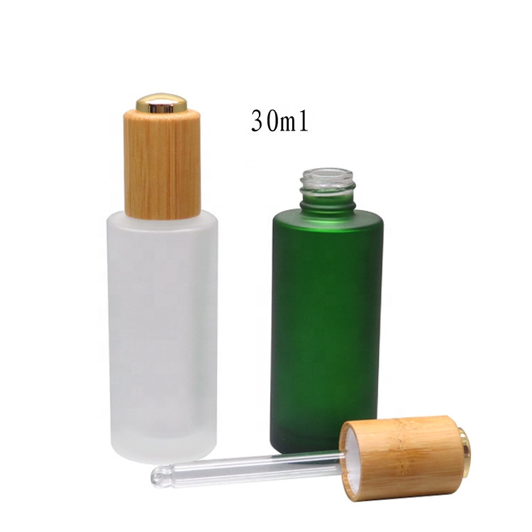 Cosmetic oil bottle green frosted 1oz 30ml flat shoulder glass bottle with bamboo pump cap