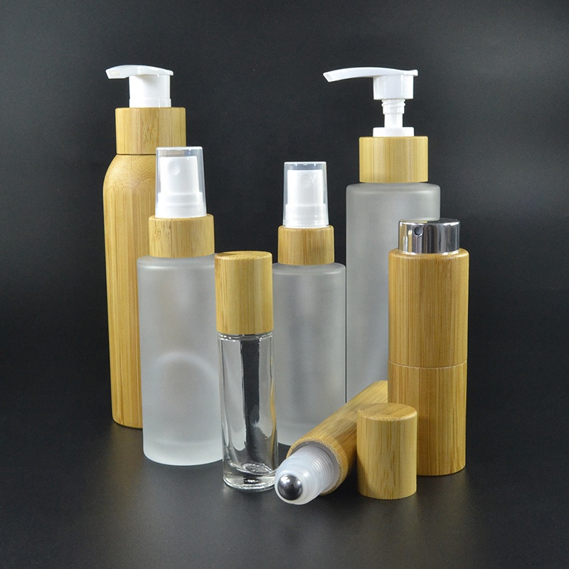 Cosmetic oil bottle green frosted 1oz 30ml flat shoulder glass bottle with bamboo pump cap