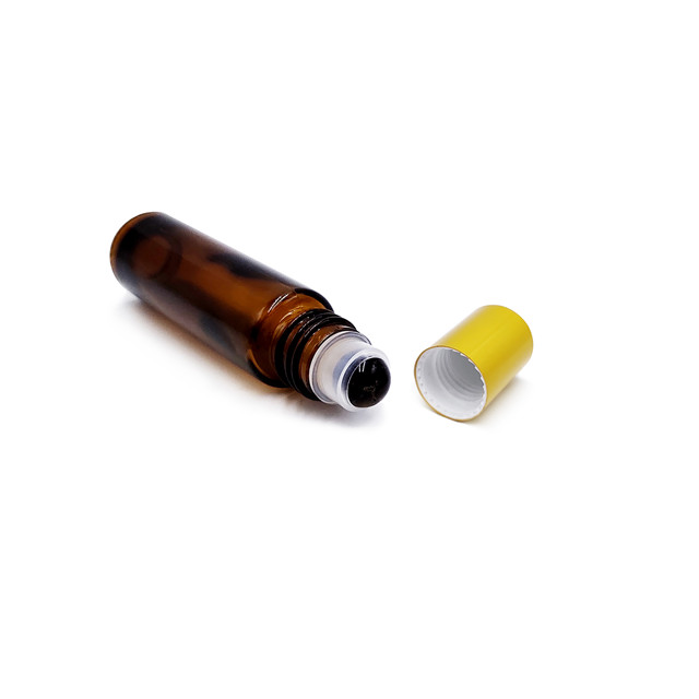 Cosmetic package colored amber essential oil roll on glass bottle