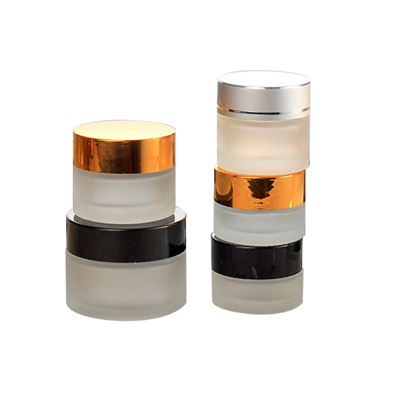 Cosmetic packaging 15g 30g 50g 100g 1 oz clear frosted glass jar with logo printing and gold or silver lids bamboo lids
