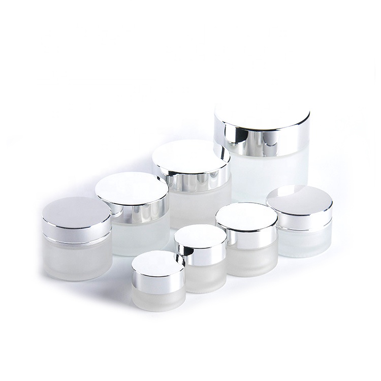 Cosmetic packaging 15g 30g 50g 100g 1 oz clear frosted glass jar with logo printing and gold or silver lids bamboo lids