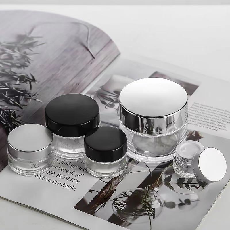 Cosmetic packaging 1oz 2oz 5g10g15g 30g 50g 100g glass cream cosmetic jar with Metallic plasticslid