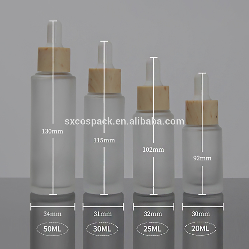 Cosmetic packaging 20ml 25ml 30ml 50ml matte clear essential oil dropper bottle with wooden cap