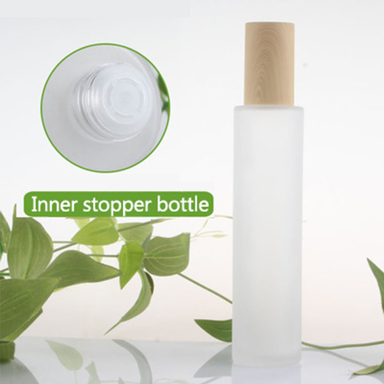 Cosmetic packaging 20ml 30ml 40ml 60ml 80ml 100ml 120ml frosted glass lotion oil perfume spray pump bottle with wood grain lid