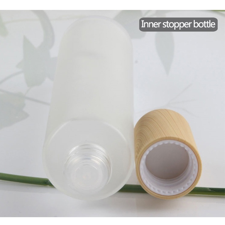 Cosmetic packaging 20ml 30ml 40ml 60ml 80ml 100ml 120ml frosted glass lotion oil perfume spray pump bottle with wood grain lid