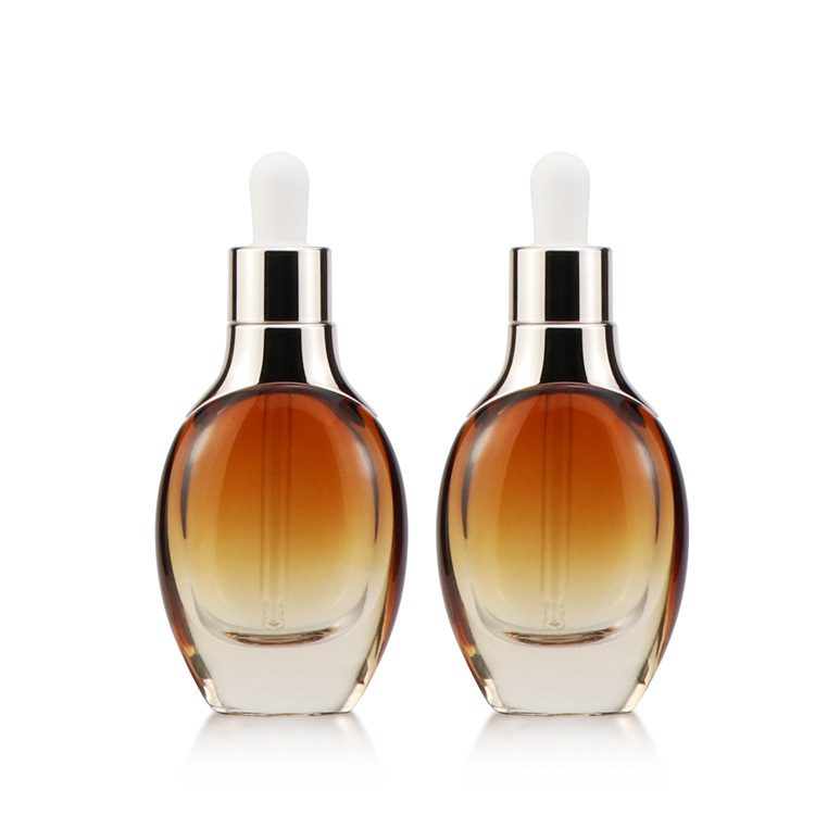 Cosmetic packaging 30ml 50ml 100ml 120ml glass essence lotion bottles full set custom amber glass bottle with rose gold pump