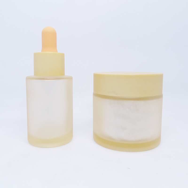 Cosmetic packaging 30ml dropper bottle and 60g cream jar frosted orange matte transparent glass bottles and jars set