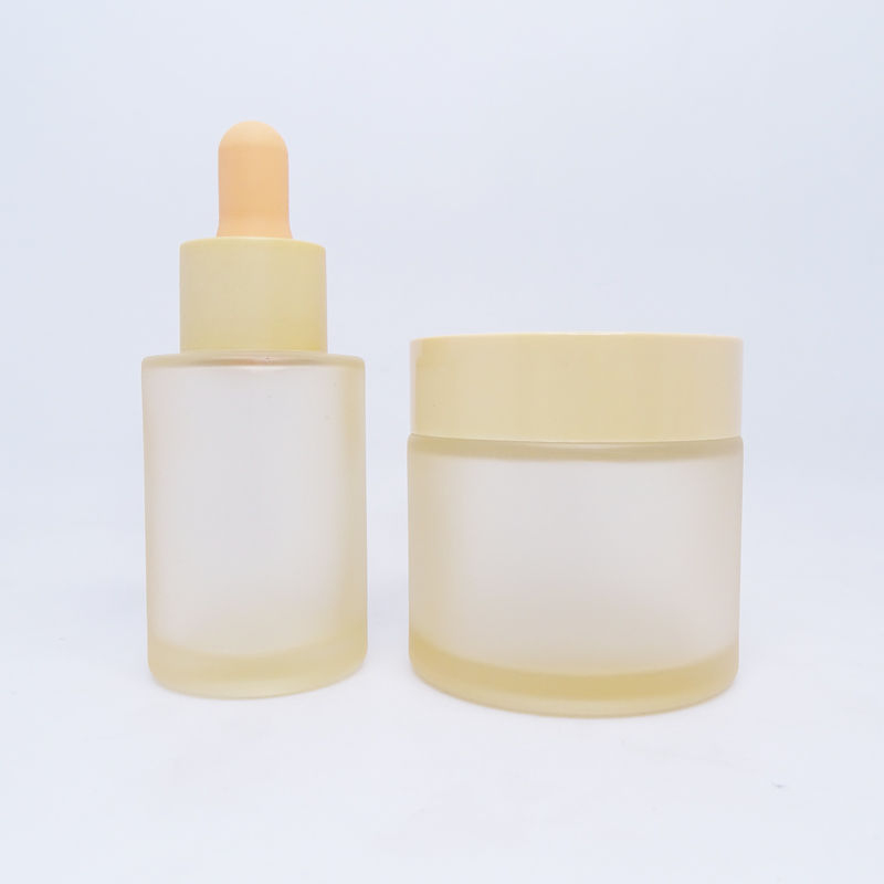 Cosmetic packaging 30ml dropper bottle and 60g cream jar frosted orange matte transparent glass bottles and jars set