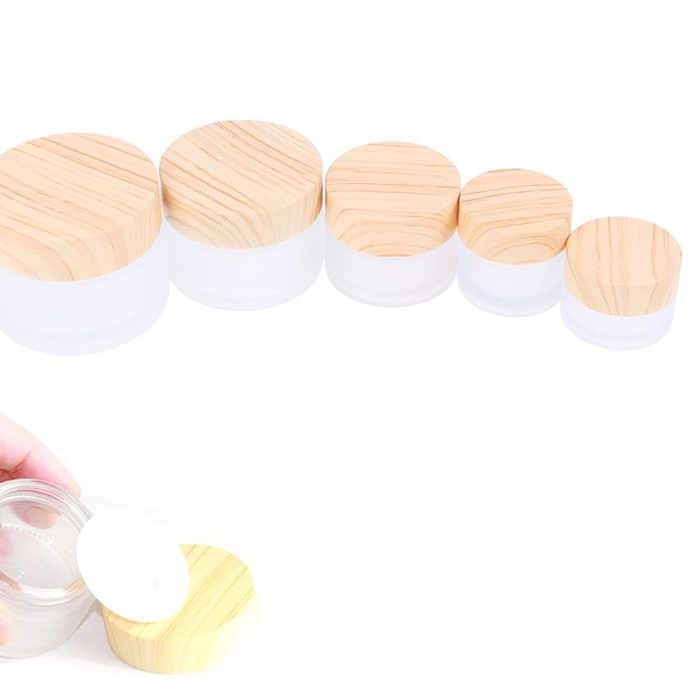 Cosmetic packaging 5ml 15ml 30ml 50ml 100ml 150ml 200ml clear white frosted bamboo wood cap lid face body cream glass jar bottle