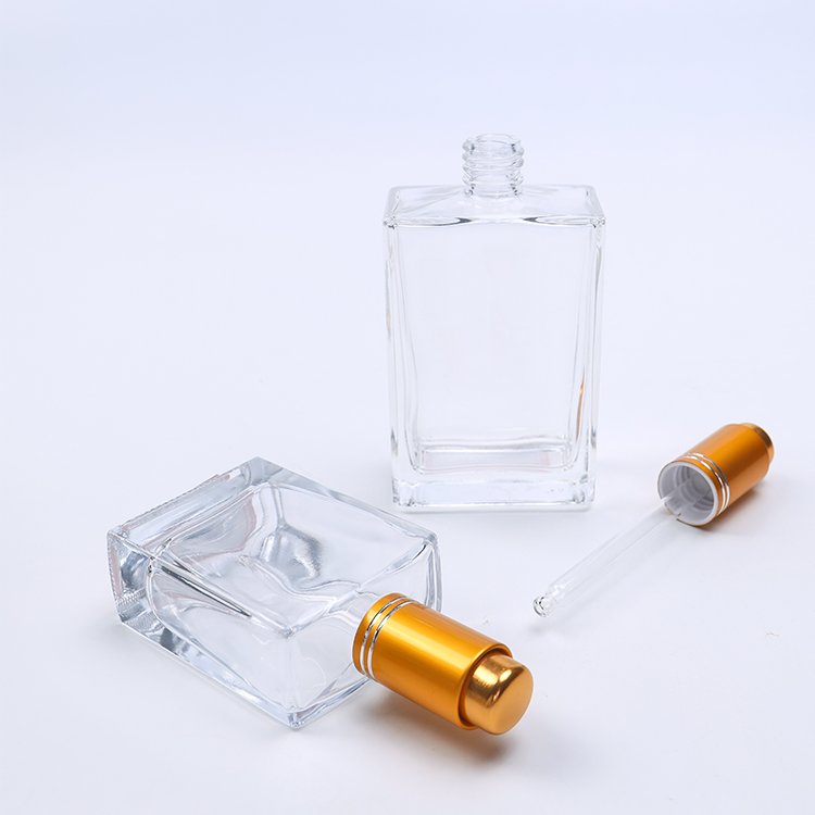 Cosmetic packaging container luxury square essential oil glass bottle with gold dropper