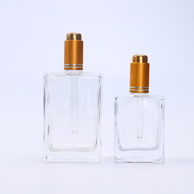 Cosmetic packaging container luxury square essential oil glass bottle with gold dropper