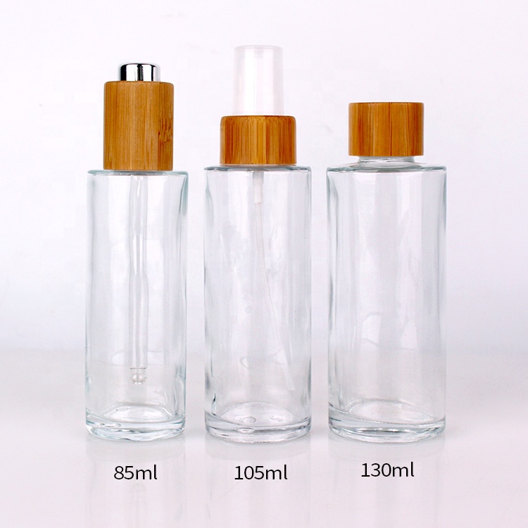 Cosmetic packaging cylinder essential oil bottle 75ml glass bottle with bamboo dropper