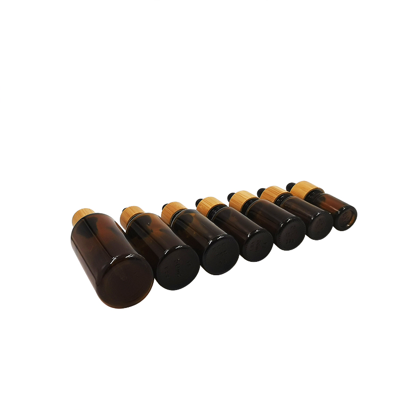 Cosmetic packaging design 10ml 15ml 30ml 50ml 100m 1oz empty amber black essential oil glass dropper bottles with bamboo lids