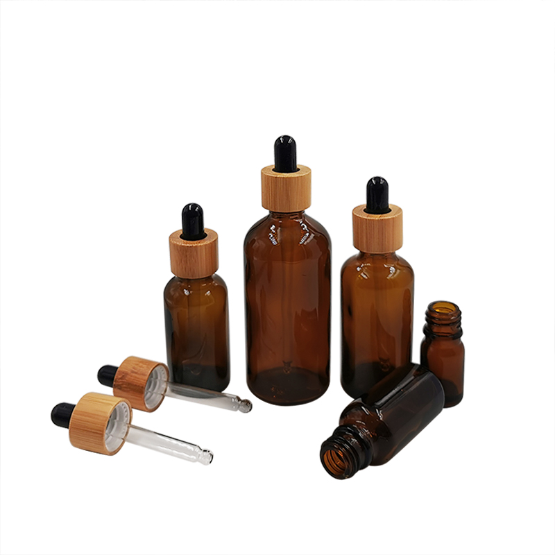 Cosmetic packaging design 10ml 15ml 30ml 50ml 100m 1oz empty amber black essential oil glass dropper bottles with bamboo lids