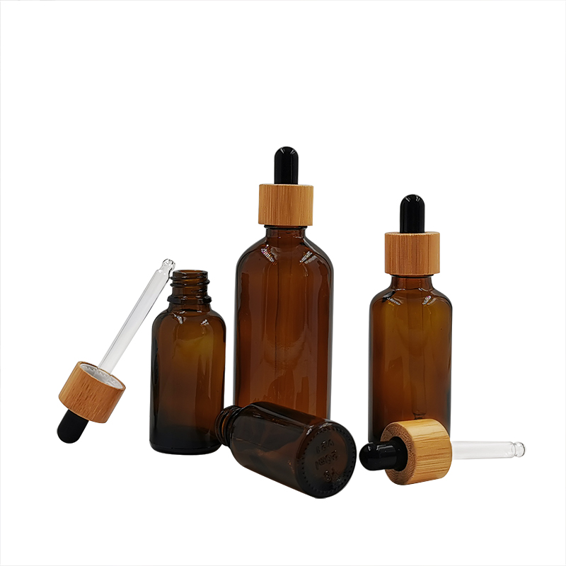 Cosmetic packaging design 10ml 15ml 30ml 50ml 100m 1oz empty amber black essential oil glass dropper bottles with bamboo lids
