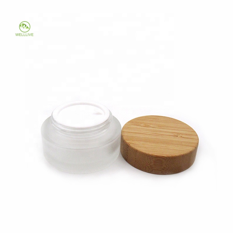Cosmetic packaging eco friendly 5ml 15ml 30ml 50ml 100ml frosted bamboo jar bamboo cosmetic jars glass jars with wood lid