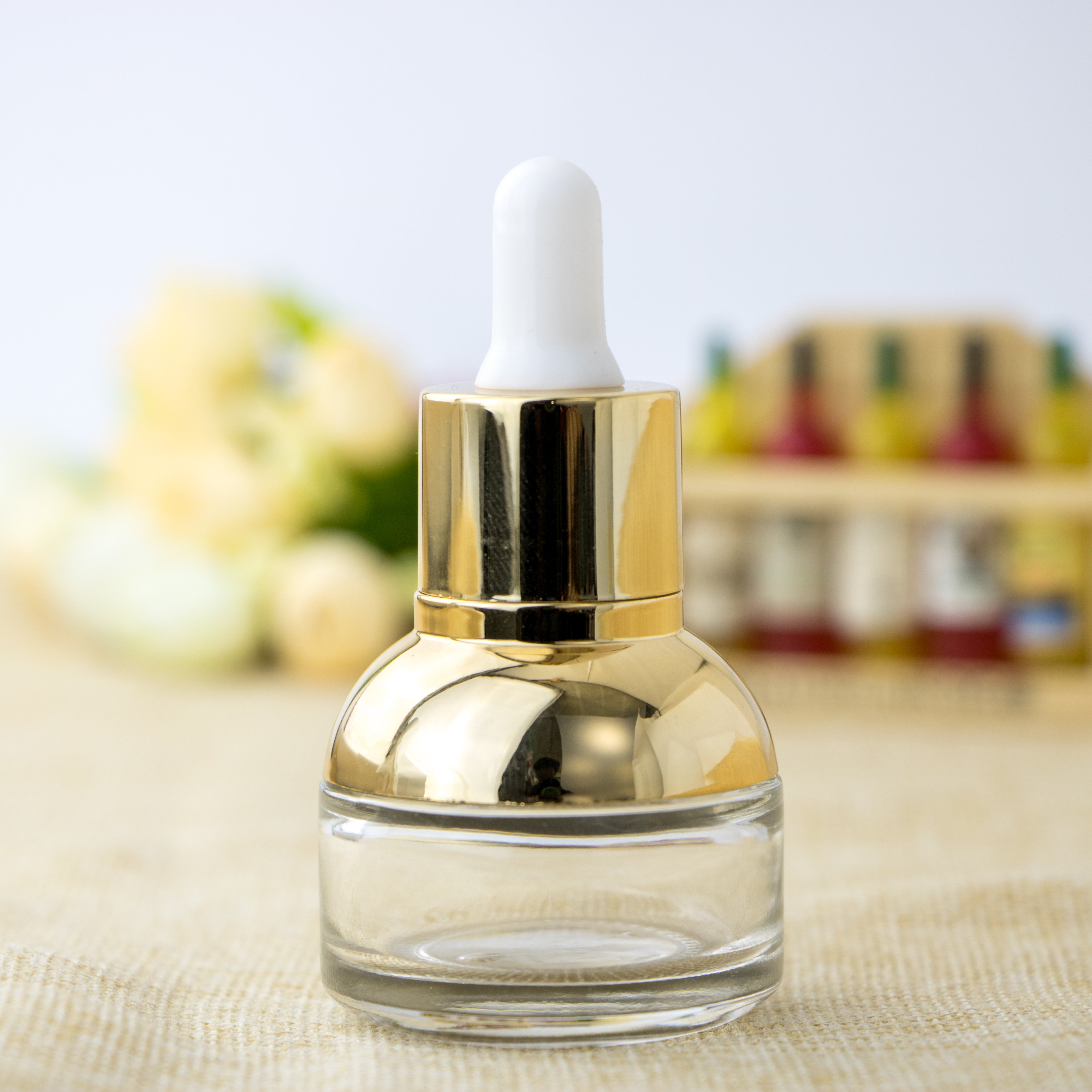 Cosmetic packaging golden shoulder semicircle transparent essential oil glass bottle with dropper