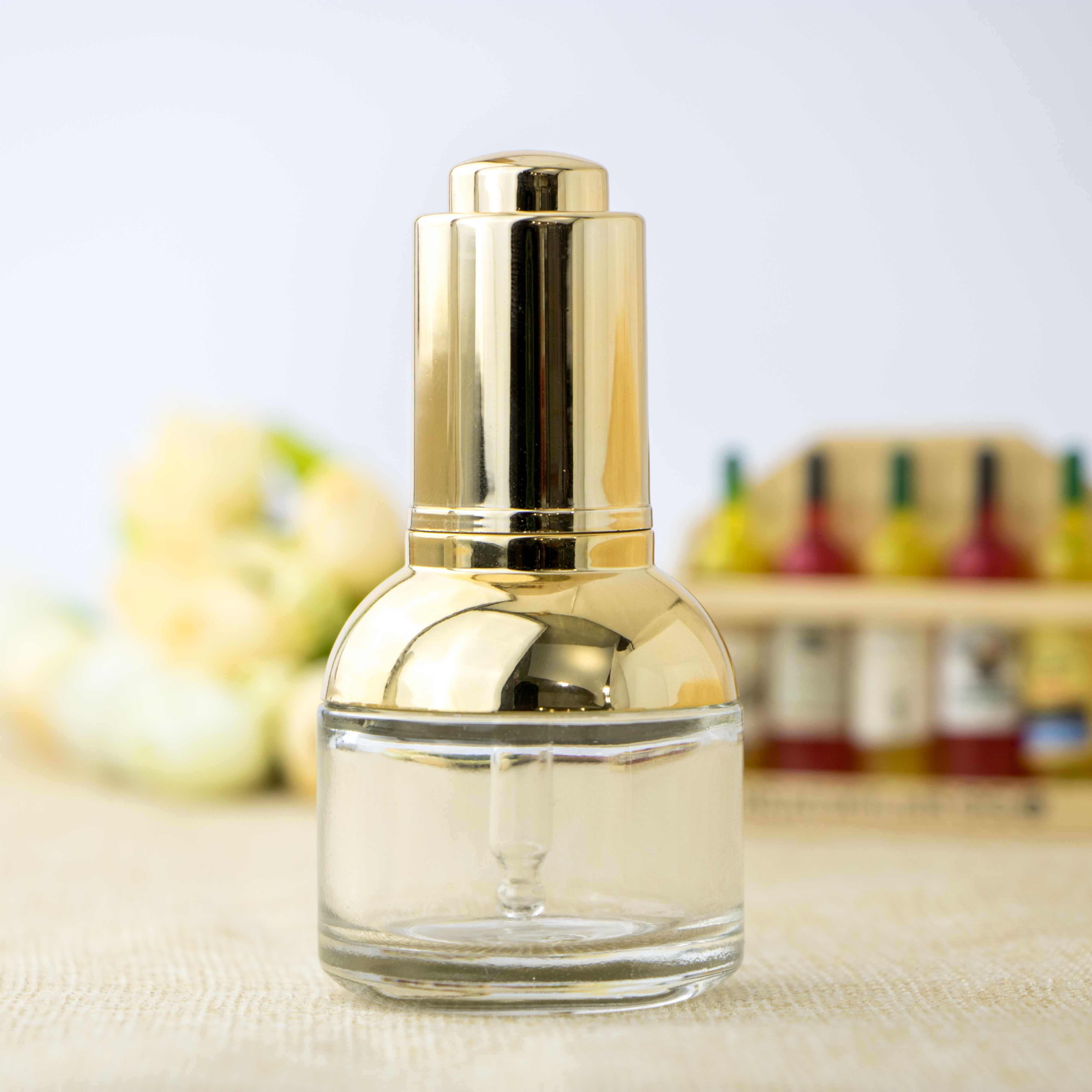 Cosmetic packaging golden shoulder semicircle transparent essential oil glass bottle with dropper