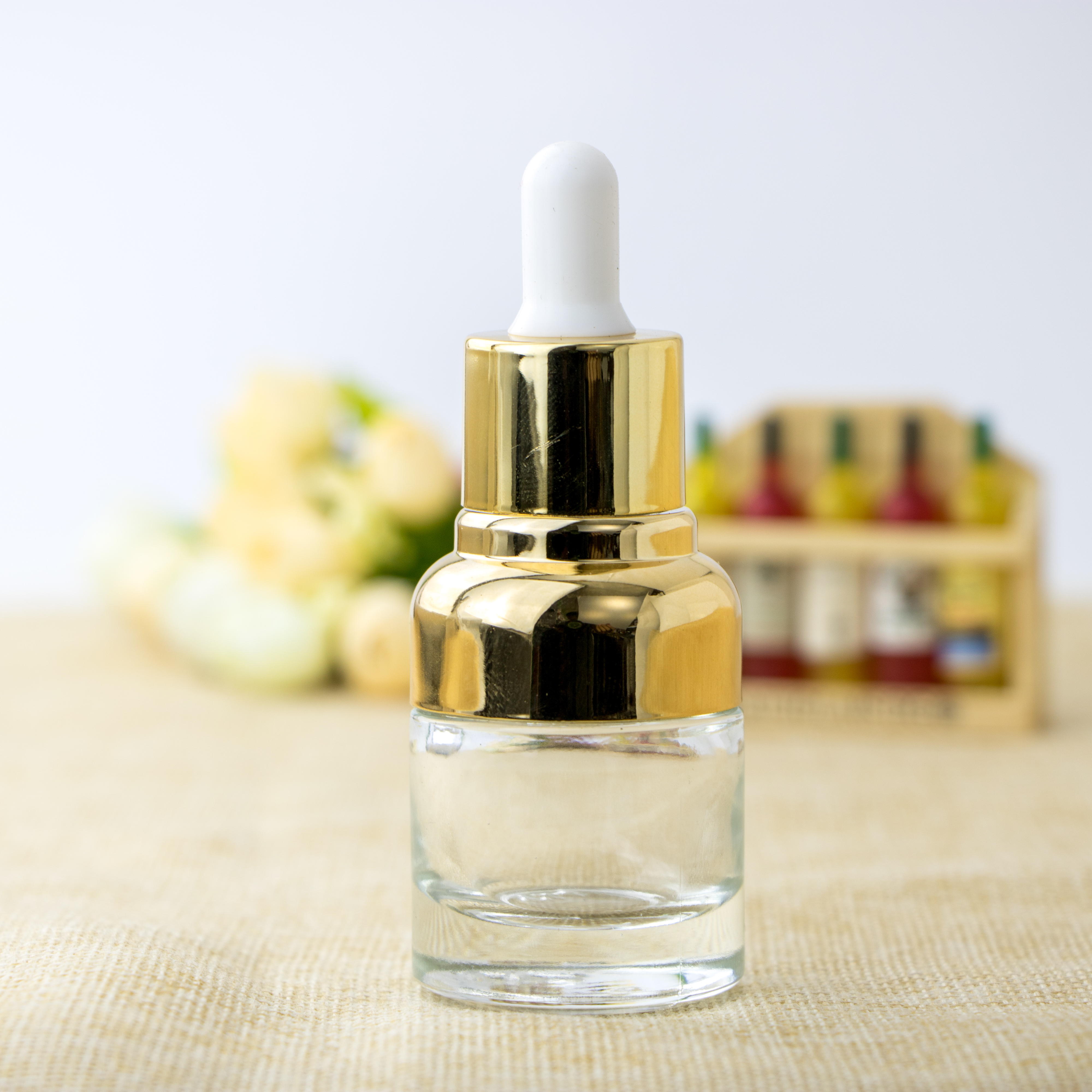 Cosmetic packaging golden shoulder semicircle transparent essential oil glass bottle with dropper