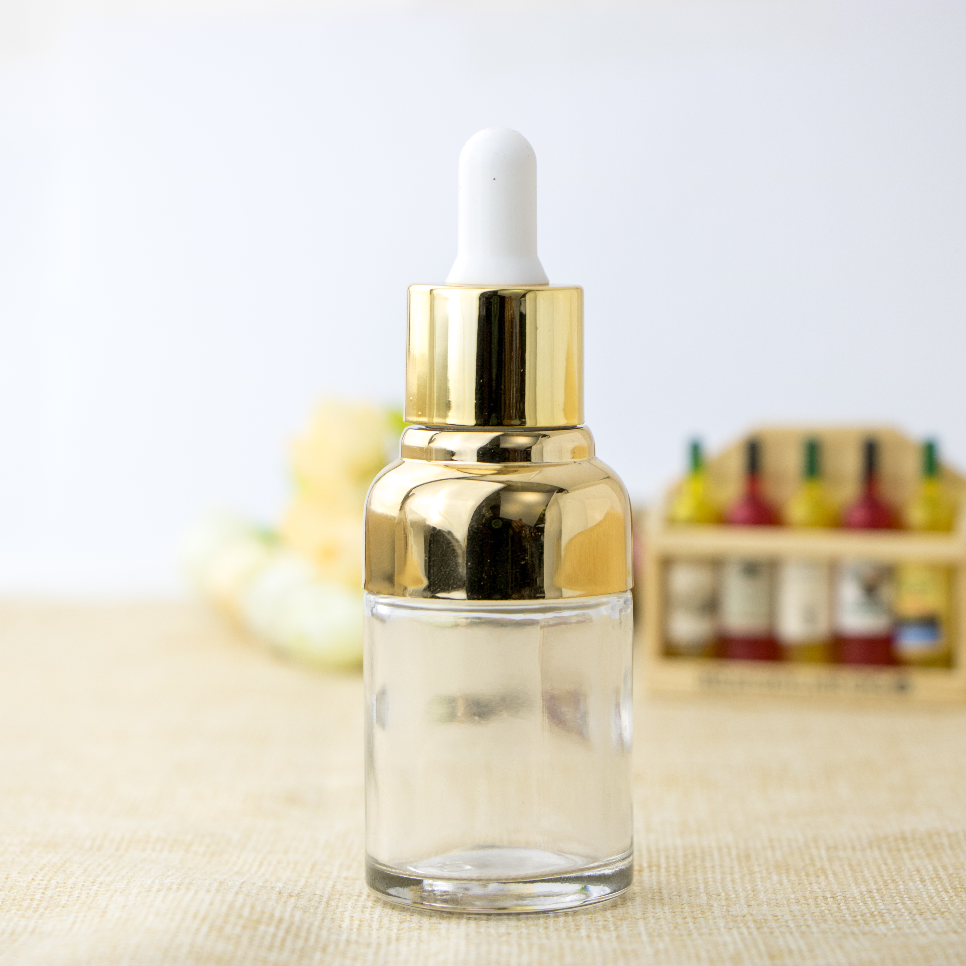 Cosmetic packaging golden shoulder semicircle transparent essential oil glass bottle with dropper