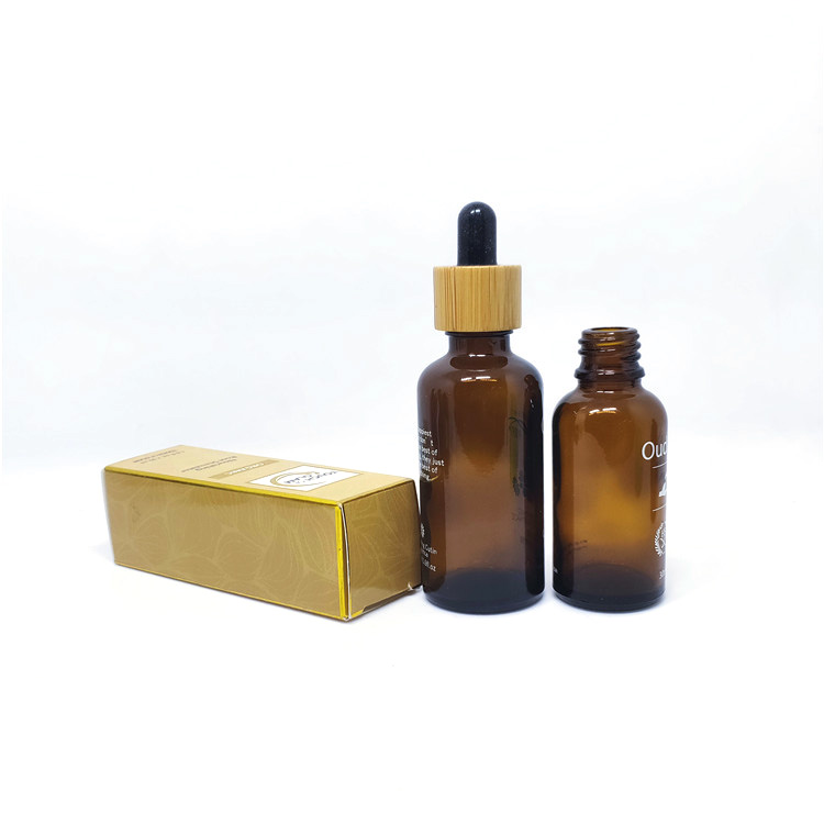 Cosmetic packaging goteros de vidrio with bamboo dropper cap