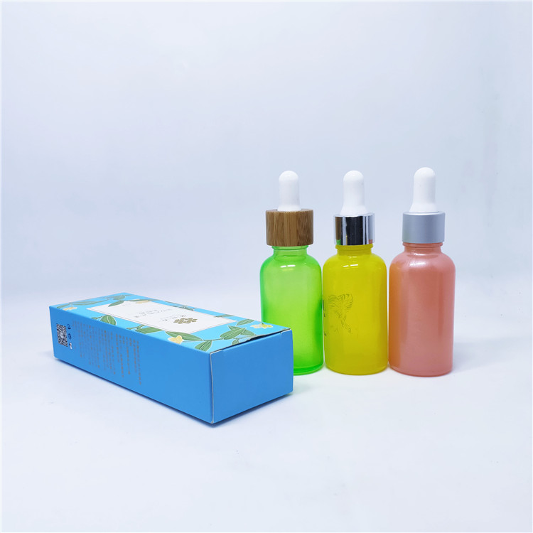 Cosmetic packaging goteros de vidrio with bamboo dropper cap