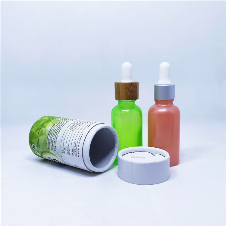Cosmetic packaging goteros de vidrio with bamboo dropper cap