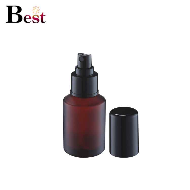 Cosmetic packaging painting 2oz frosted amber glass jars cosmetic glass bottle glass lotion bottle with black metal lid