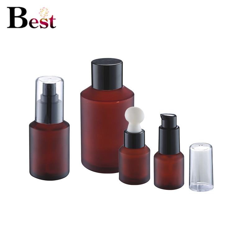Cosmetic packaging painting 2oz frosted amber glass jars cosmetic glass bottle glass lotion bottle with black metal lid