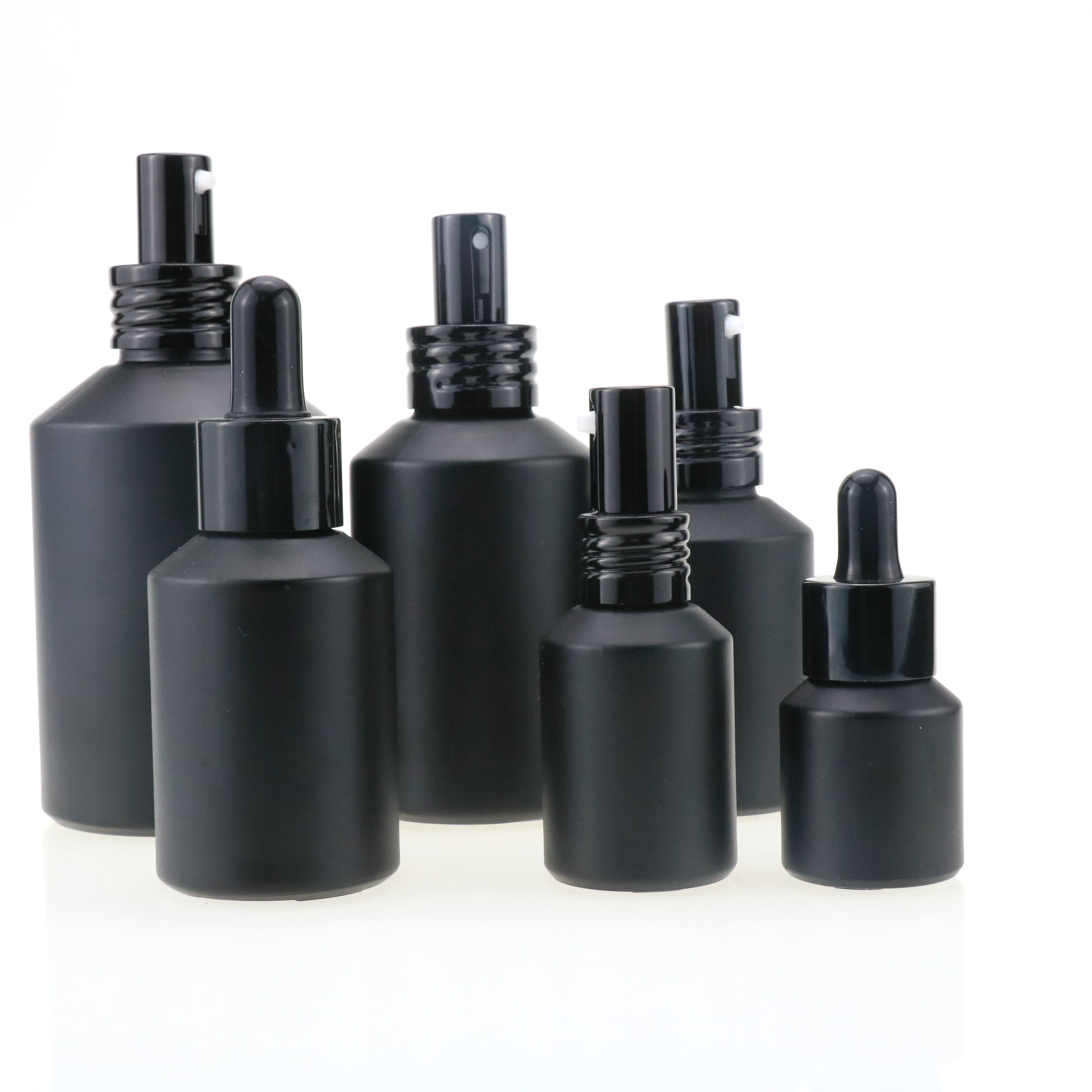 Cosmetic packaging slant shoulder matte black skin care set glass bottle cosmetic products with black dropper and jar with lid