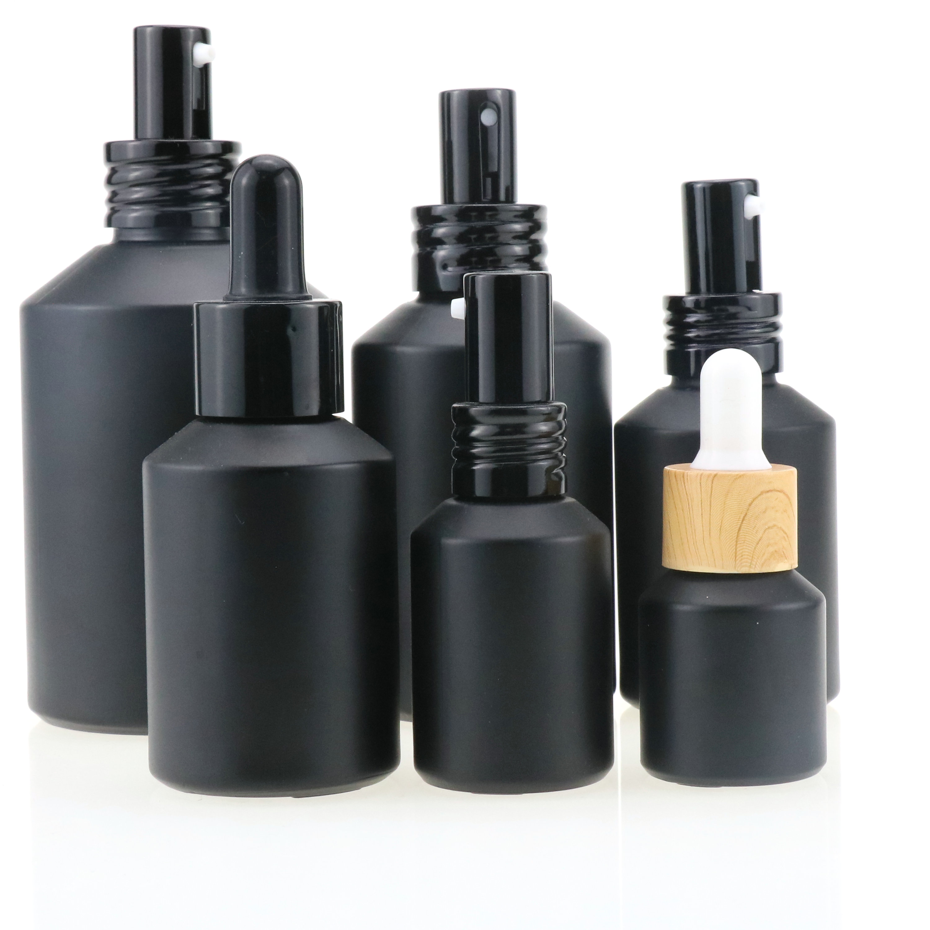 Cosmetic packaging slant shoulder matte black skin care set glass bottle cosmetic products with black dropper and jar with lid