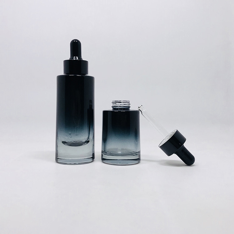 Cosmetic packaging stock products oval shape black 30ml luxury glass bottle