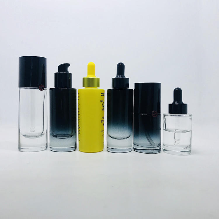 Cosmetic packaging stock products oval shape black 30ml luxury glass bottle