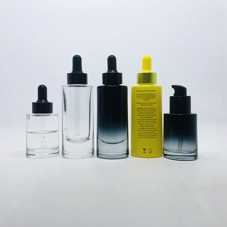 Cosmetic packaging stock products oval shape black 30ml luxury glass bottle