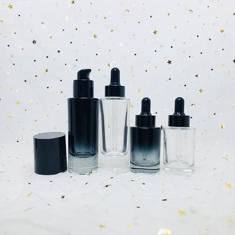 Cosmetic packaging stock products oval shape black 30ml luxury glass bottle