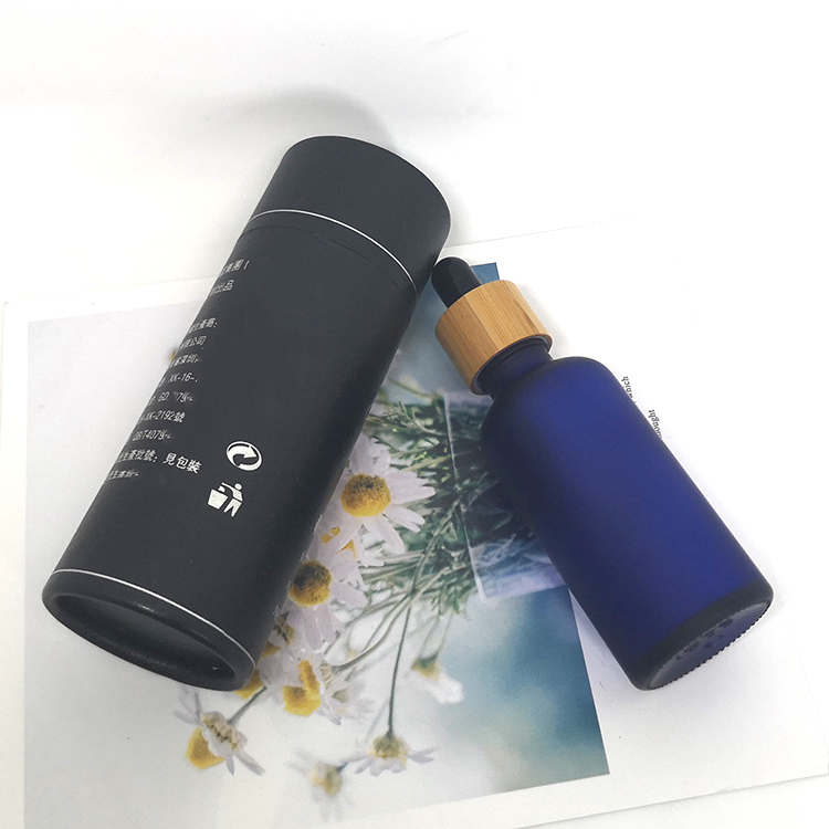 Cosmetic skin care oil packaging 30ml frosted cobalt blue glass bottles with bamboo dropper caps