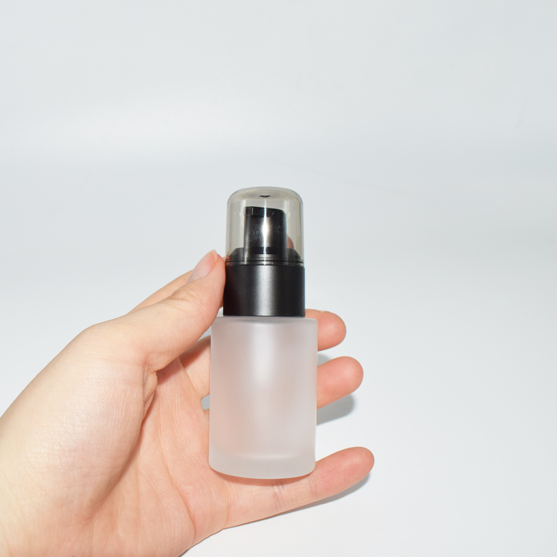 Cosmetic skincare packaging flat shoulder glass bottle 100 ml black pump body lotion bottle
