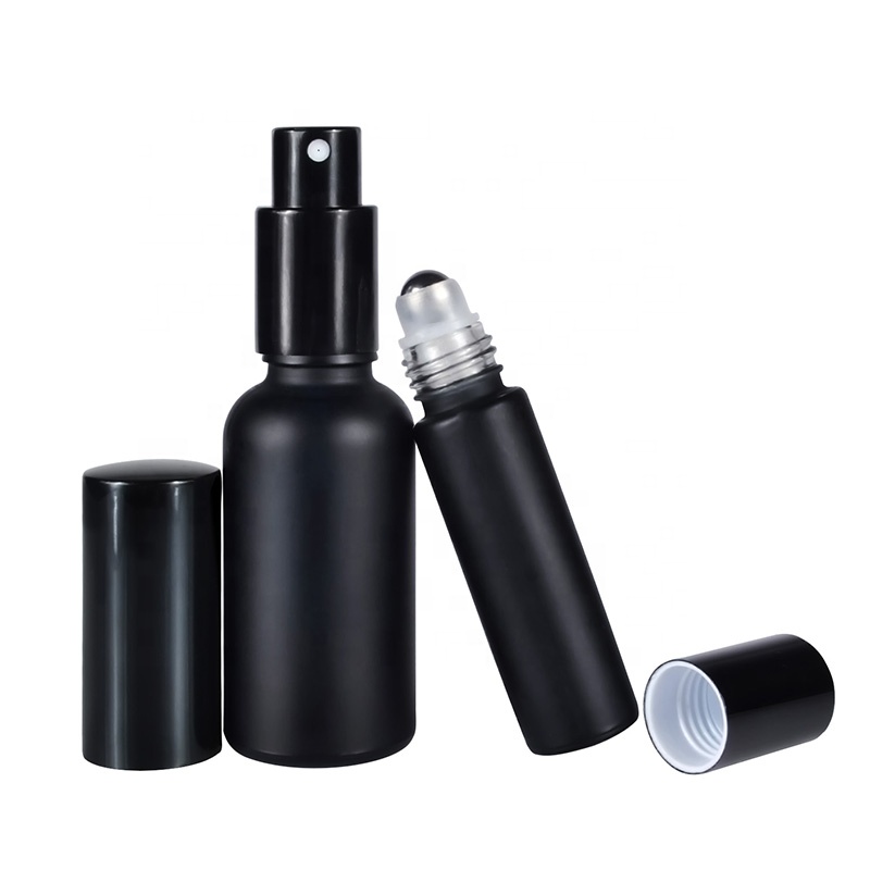 Cosmetics 30ml 1oz matt frosted black glass sprayer pump bottle and 10ml frosted black glass roller bottle with metal ball