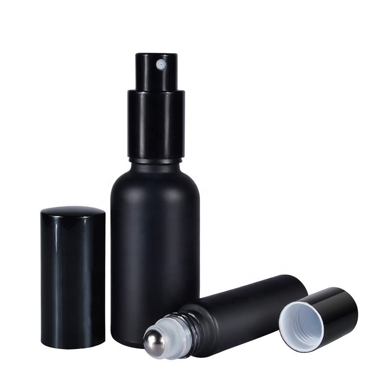 Cosmetics 30ml 1oz matt frosted black glass sprayer pump bottle and 10ml frosted black glass roller bottle with metal ball