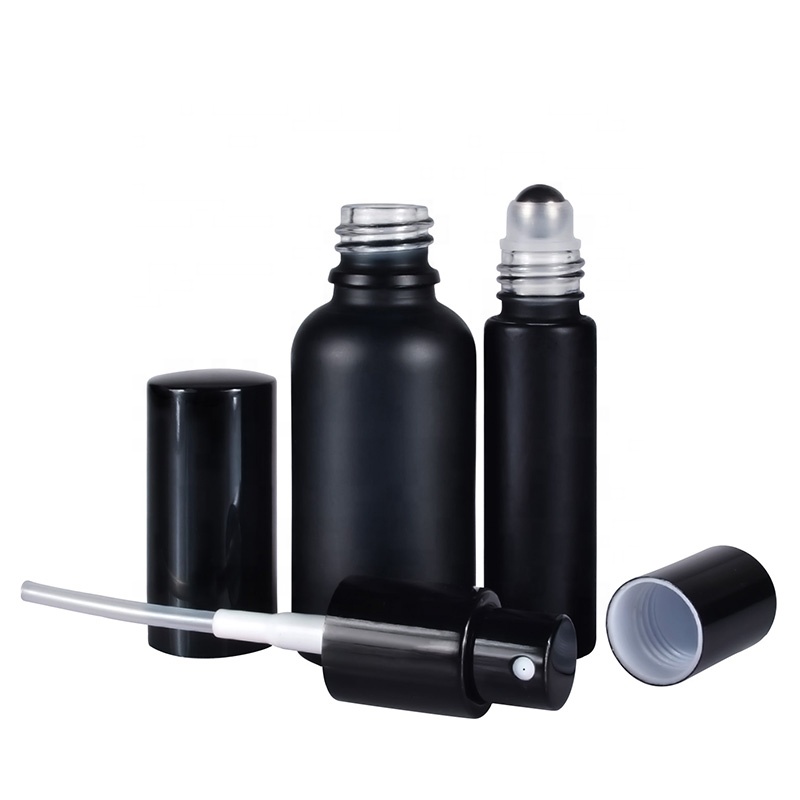 Cosmetics 30ml 1oz matt frosted black glass sprayer pump bottle and 10ml frosted black glass roller bottle with metal ball