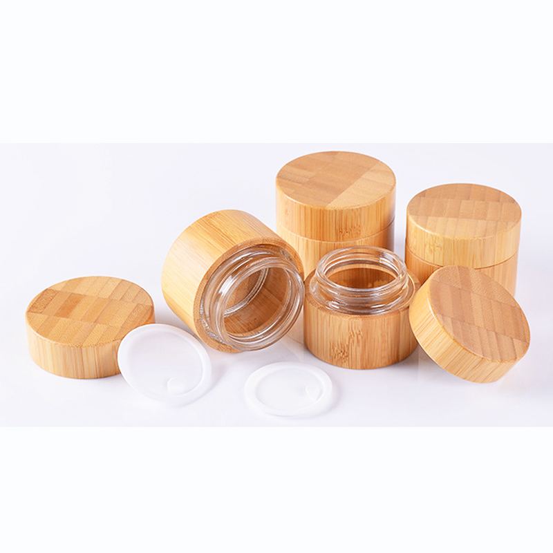 Cream wooden cosmetic jar and bottle glass with bamboo pump and cap 30g 50g 100g frosted glass bottle and jar set with bamboo