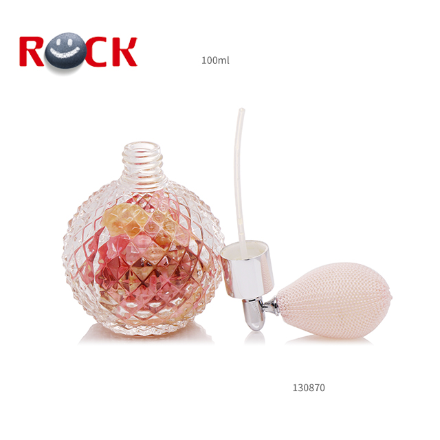 Creative design 100ml ball shape glass perfume bottle with airbag pump sprayer cap