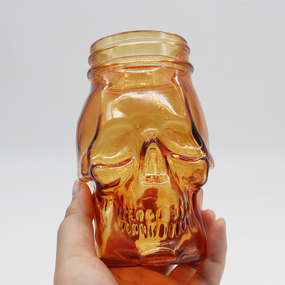 Creative xuzhou wholesale 350ml 450ml 500ml Skull Mason Jar With Handle and metal lid